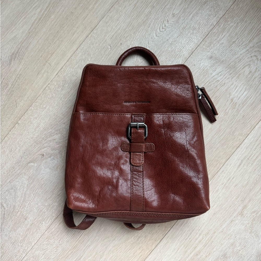 Sophisticated Brown Genuine Leather Spikes & Sparrow Backpack